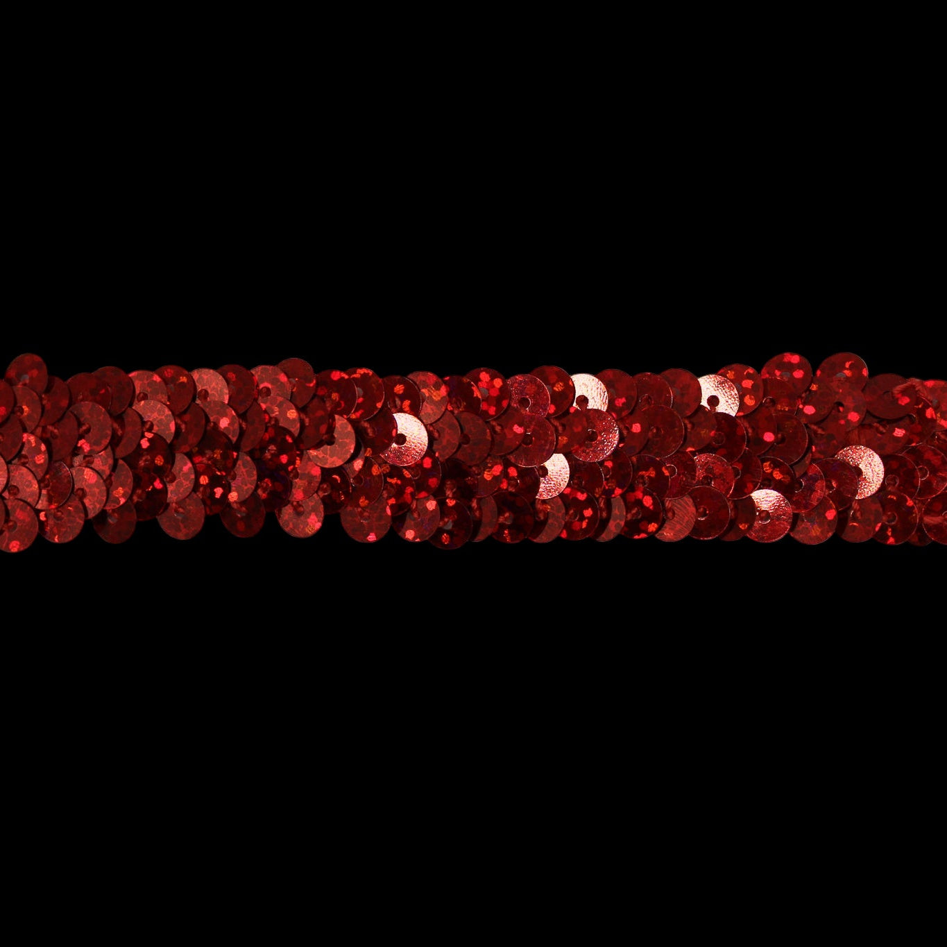 Red sequin strip on a gray background