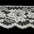 White lace trim on a black background