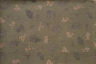 Olive green fabric with a repeating pattern of small brown leaves and peach-orange flowers