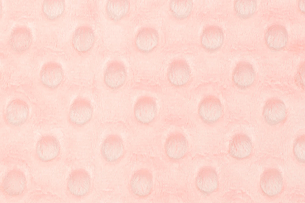 Pattern of small circles on a pink background