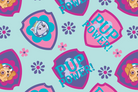 A repeating cartoon pattern on a light aqua background, featuring pink and purple shield-shaped badges with the words “PUP POWER!” and small flower motifs. The central badge shows a white puppy illustration, and the surrounding badges include cropped puppy faces in tan and cream tones.