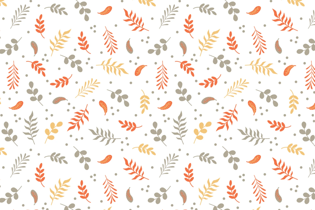 Pattern of small leaves and berries on a white background